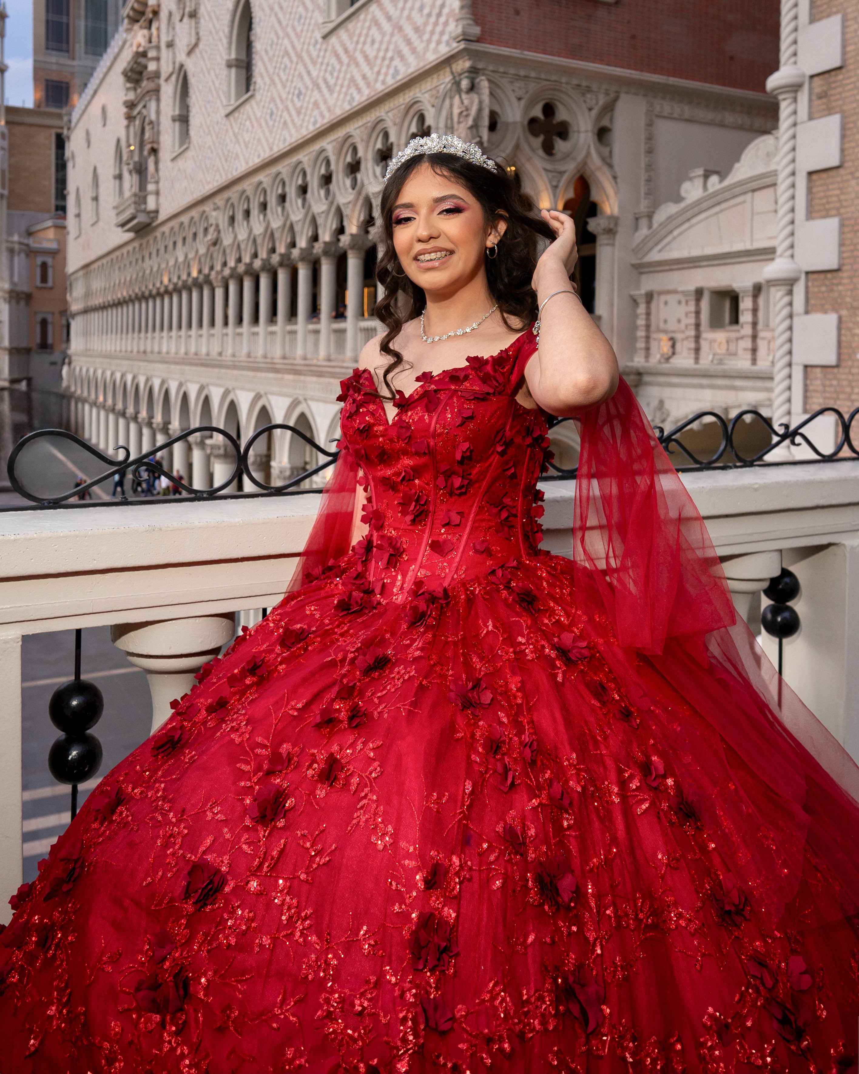 Quinceañera in red gown at Venetian